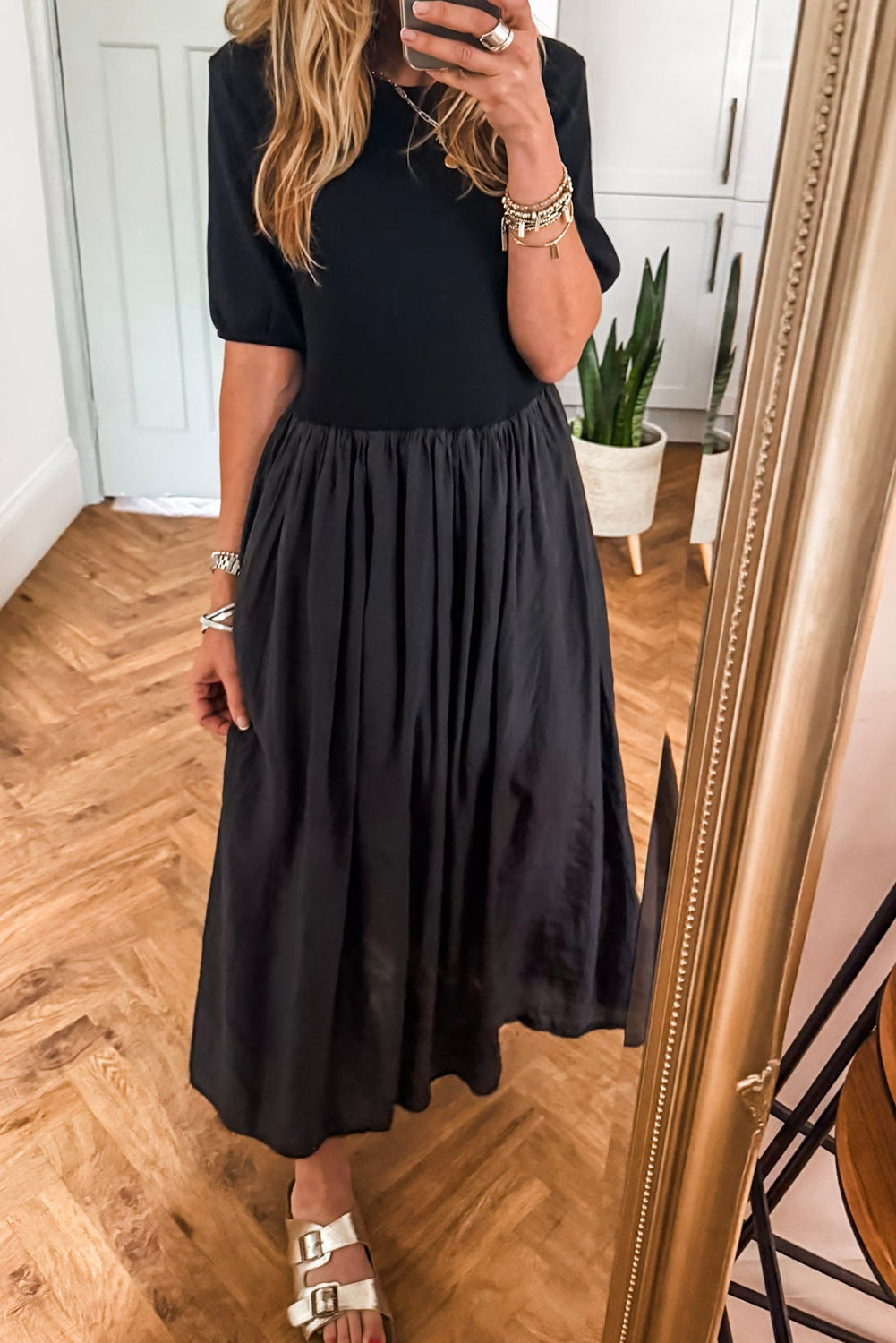 Vestido largo negro patchwork con top tejido y falda plisada