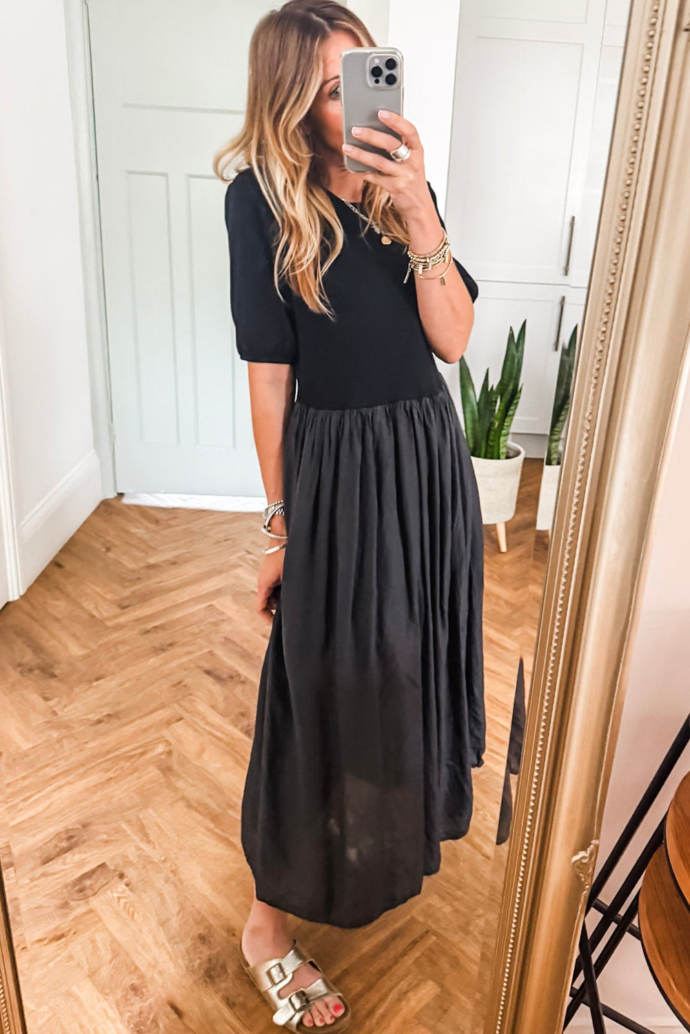 Vestido largo negro patchwork con top tejido y falda plisada