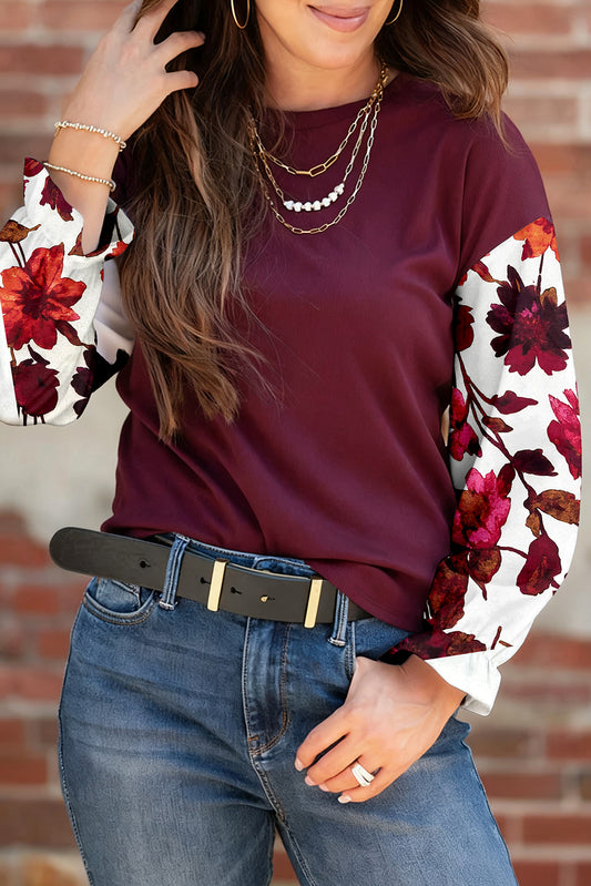 Blusa floral patchwork con cuello redondo y mangas caídas