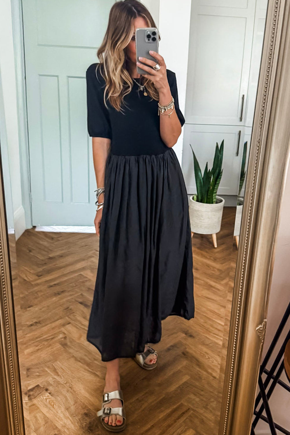 Vestido largo negro patchwork con top tejido y falda plisada