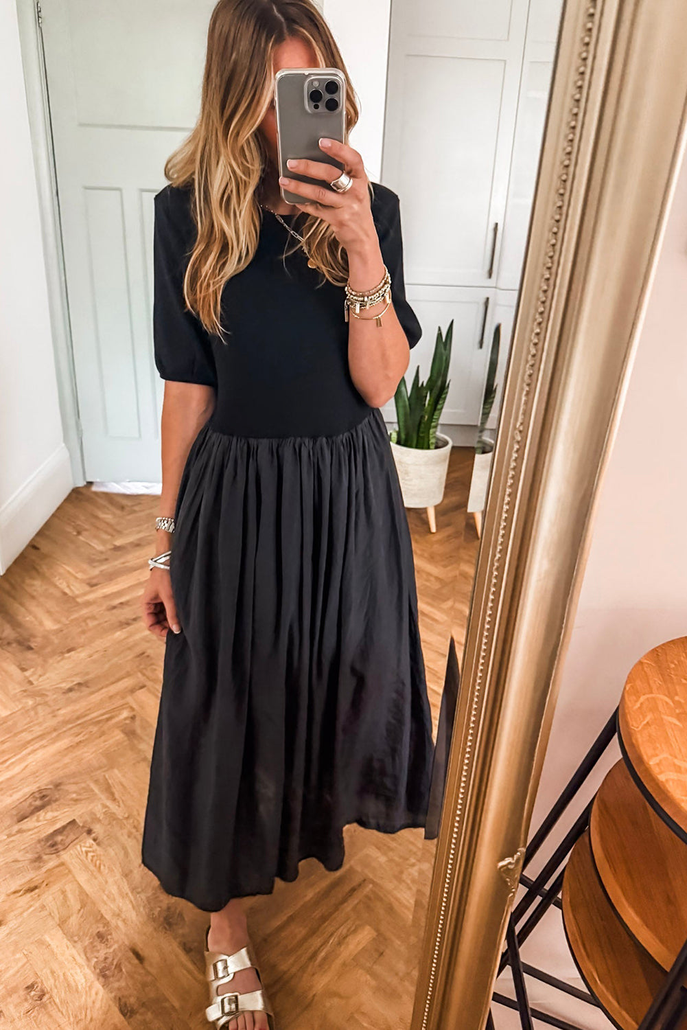 Vestido largo negro patchwork con top tejido y falda plisada