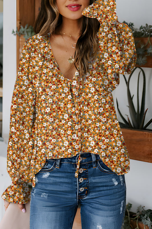 Blusa boho floral naranja con escote en V y mangas abullonadas