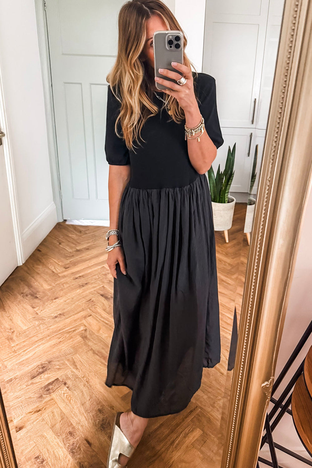 Vestido largo negro patchwork con top tejido y falda plisada