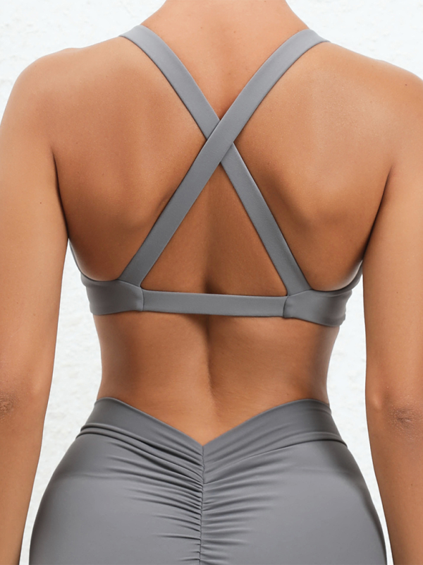 Top deportivo ajustado y de secado rápido para yoga y running al aire libre, con espalda cruzada, ideal como ropa interior deportiva para fitness.